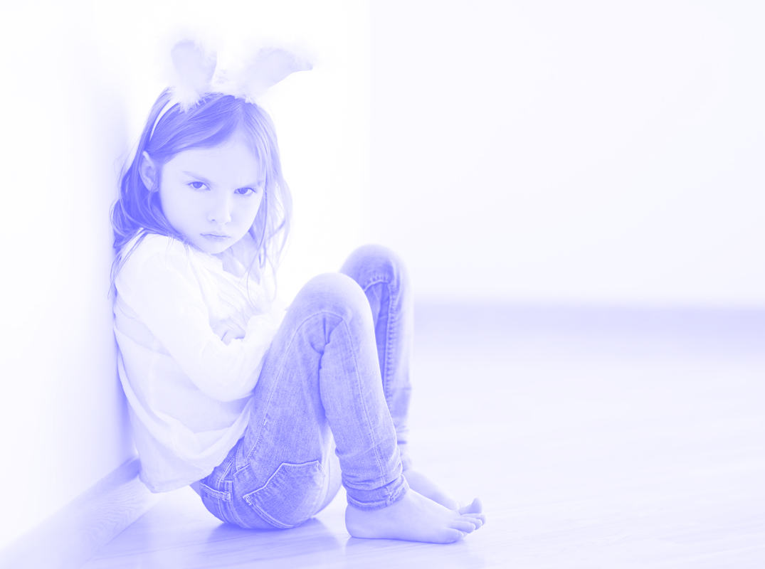 a girl sitting on the floor