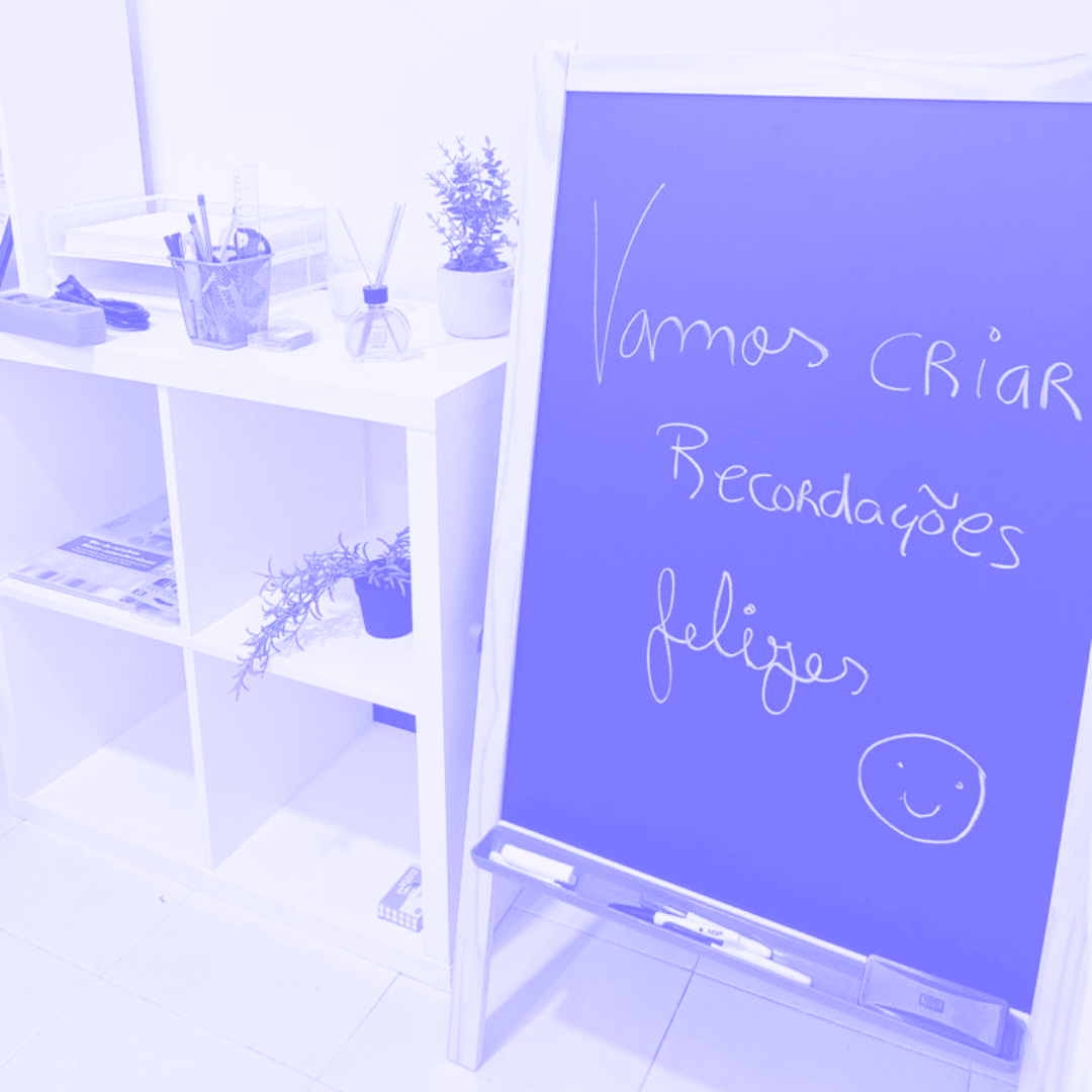 a chalkboard next to a shelf